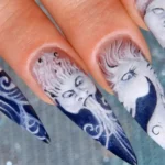 Best Halloween Nail Art Ideas 2025 You'll Want to Try Right Now 19 3D Halloween nail art with bats and skulls