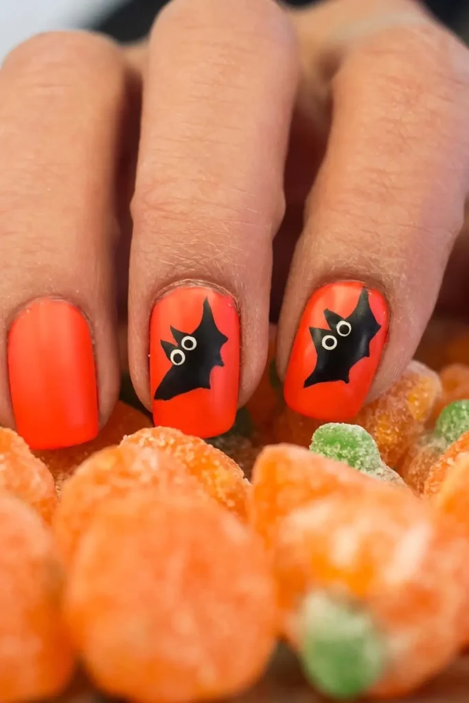 Best Halloween Nail Art Ideas 2025 You'll Want to Try Right Now 7 cute pumpkin halloween nails 2025