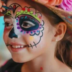 Easy and safe Halloween makeup for toddlers with pumpkin design