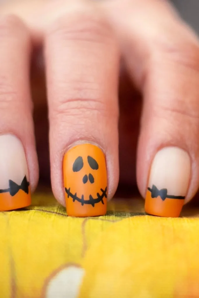 Best Halloween Nail Art Ideas 2025 You'll Want to Try Right Now 4 orange and black halloween nail designs